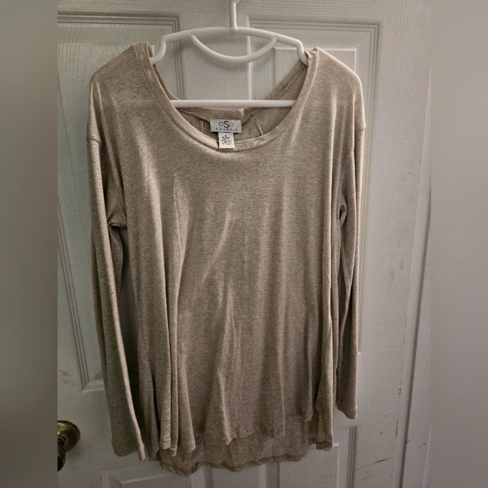 Cream colored long sleeve blouse